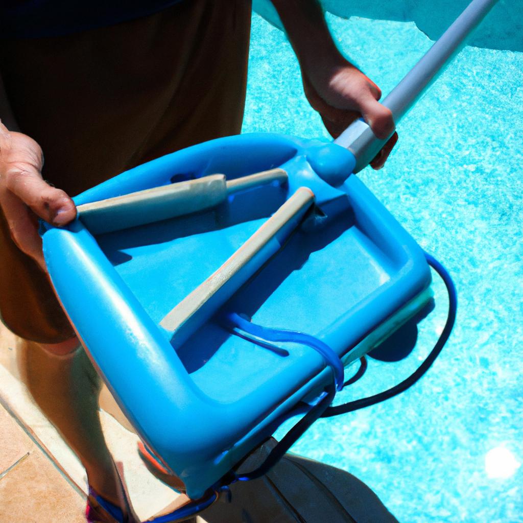 Person holding pool cleaning equipment